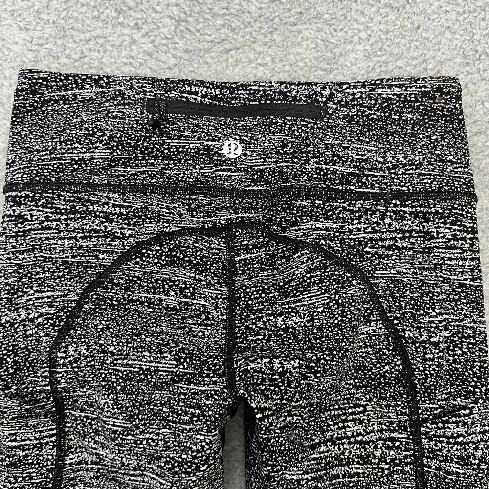 Lululemon Speed Up‎ Tight Women 4 Black White Excellent Mesh Pocket Leggings